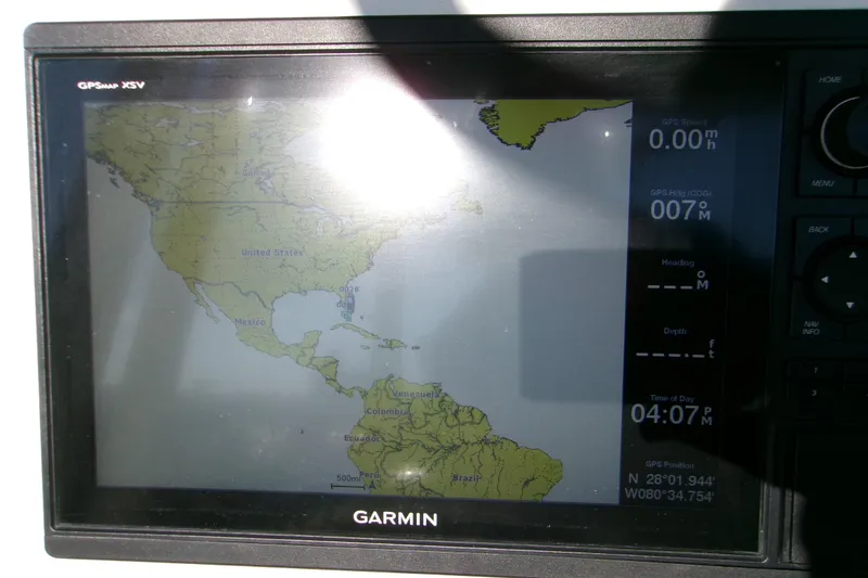 Slide: The Image of Garmin GPS display on 2020 Key West 239 FS boat showing map and coordinates. - 8
