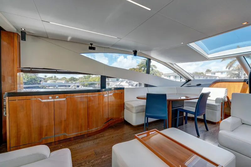 Slide: The Image of Luxurious interior of 2017 Sunseeker 68 Sport Yacht with elegant wood finishes and modern seating. - 17