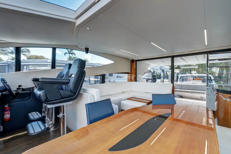 Slide: The Image of Luxurious interior of 2017 Sunseeker 68 Sport Yacht with modern seating and sleek design. - 19