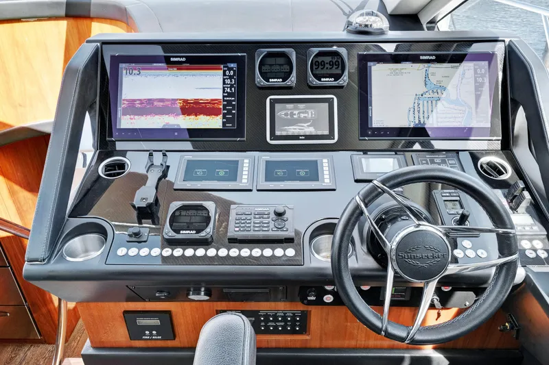 Slide: The Image of Control panel of a 2017 Sunseeker 68 Sport Yacht with advanced navigation systems. - 20