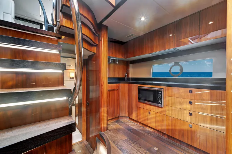 Slide: The Image of Luxurious interior of 2017 Sunseeker 68 Sport Yacht with modern kitchen and wooden finishes. - 22