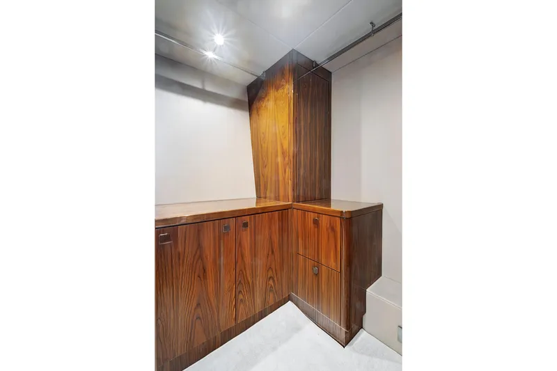 Slide: The Image of Luxurious wooden cabinetry inside 2017 Sunseeker 68 Sport Yacht interior. - 29