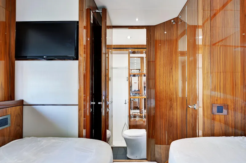 Slide: The Image of Luxurious interior of 2017 Sunseeker 68 Sport Yacht with wood paneling and modern amenities. - 35