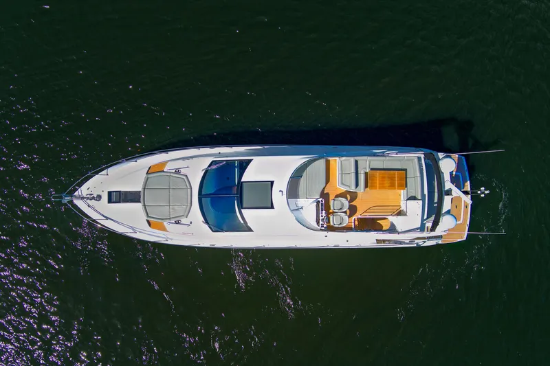 Slide: The Image of Aerial view of 2017 Sunseeker 68 Sport Yacht on water. - 4