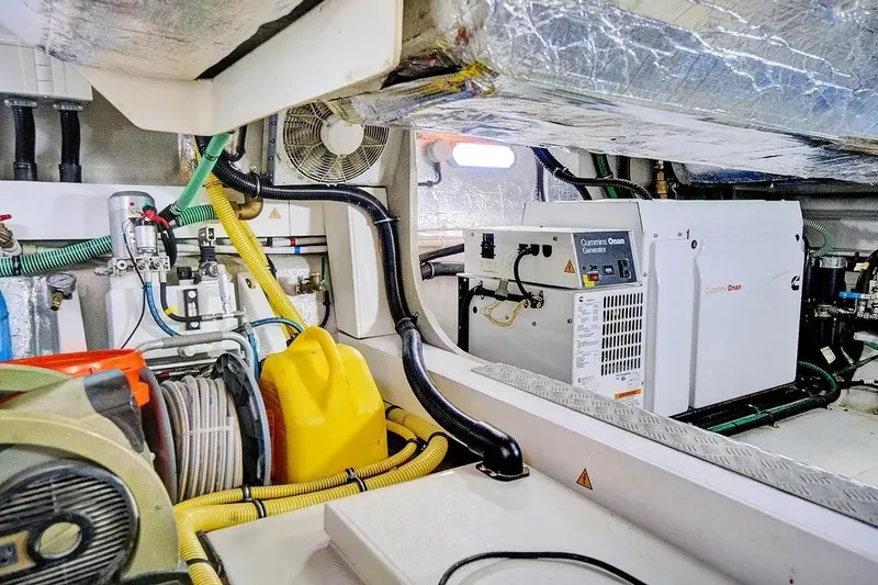Slide: The Image of Engine room of 2017 Sunseeker 68 Sport Yacht with Cummins Onan generator. - 43