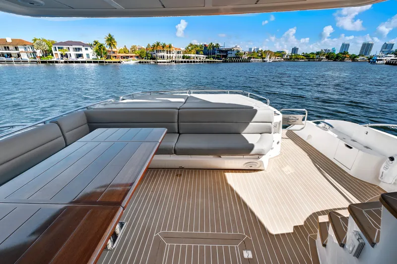 Slide: The Image of 2017 Sunseeker 68 Sport Yacht with spacious deck and waterfront view. - 8