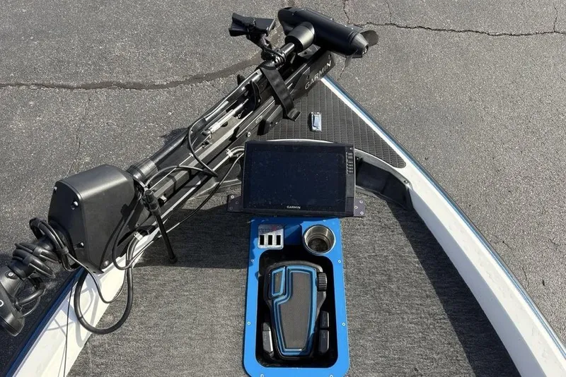 Slide: The Image of Front deck of a 1997 Javelin 400 SE boat with Garmin electronics. - 13