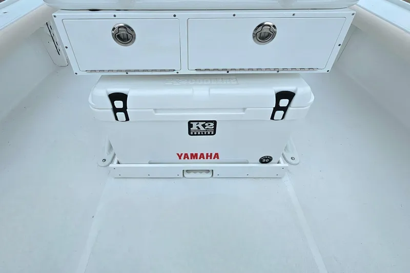 Slide: The Image of 2026 Sea Hunt BX 22 BR boat interior with K2 cooler and Yamaha branding. - 14