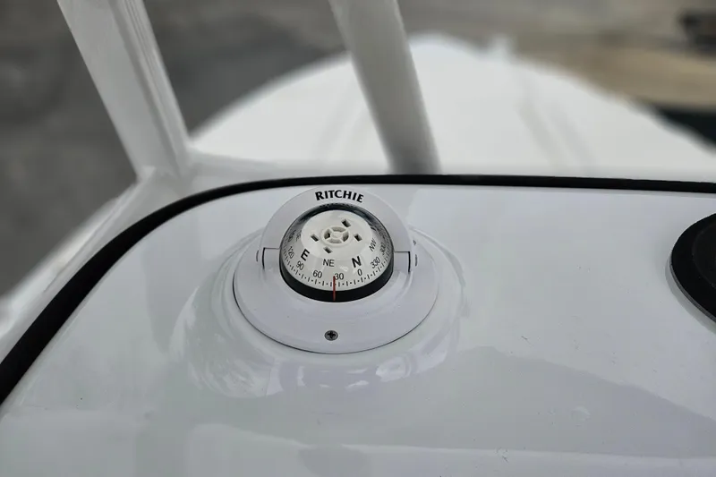 Slide: The Image of Compass on 2026 Sea Hunt BX 22 BR boat dashboard, featuring Ritchie brand. - 21