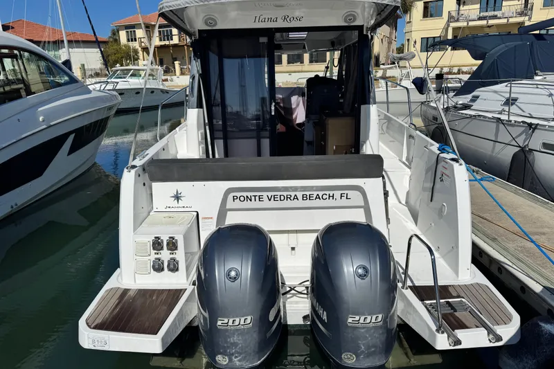 Slide: The Image of 2019 Jeanneau NC 895 boat docked, featuring dual Yamaha 200 engines, Ponte Vedra Beach, FL. - 28