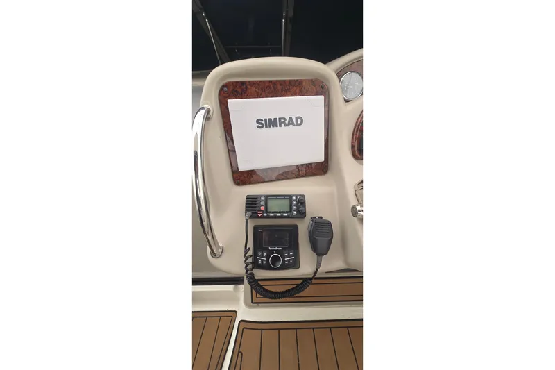 Slide: The Image of Helm of 2007 Sea Ray 340 Sundancer with Simrad navigation system. - 9
