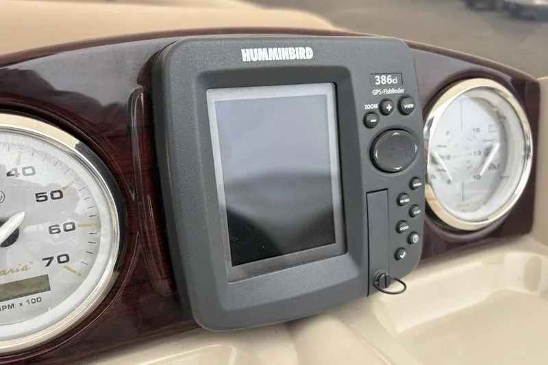 Slide: The Image of Dashboard of 2013 Berkshire 233 RFX STS with Humminbird GPS fishfinder. - 27