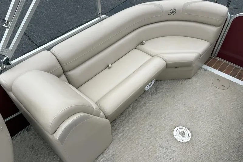 Slide: The Image of Luxurious beige seating on 2013 Berkshire 233 RFX STS boat, featuring elegant design. - 35