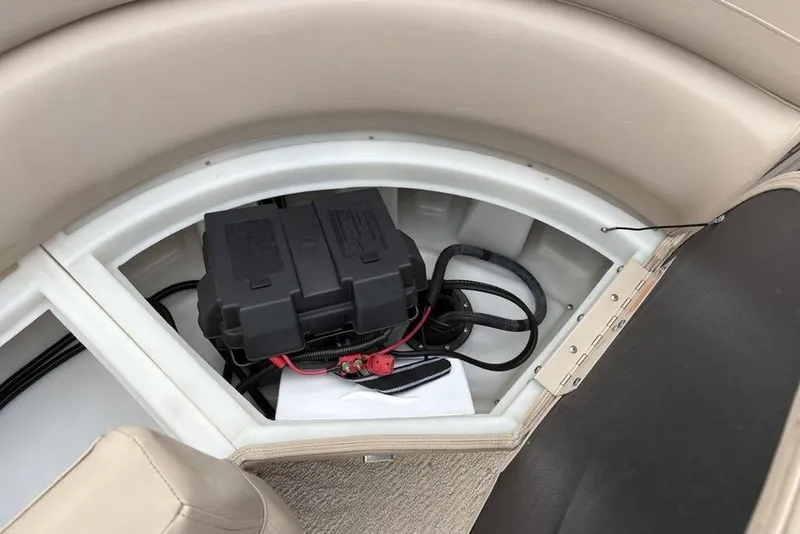 Slide: The Image of Battery compartment of 2013 Berkshire 233 RFX STS boat with wiring. - 36