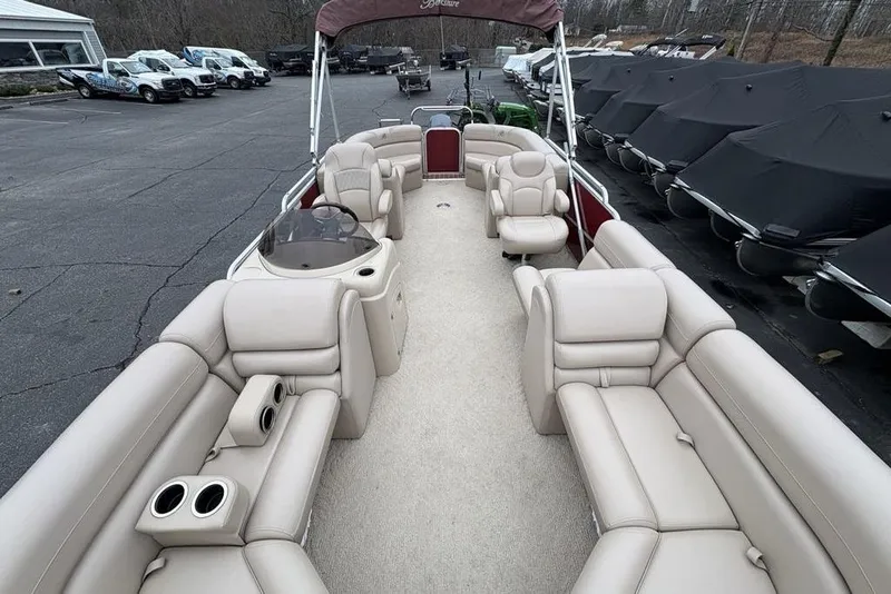 Slide: The Image of 2013 Berkshire 233 RFX STS pontoon boat with beige seating and spacious interior. - 37