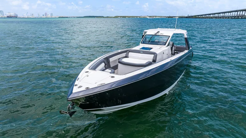 Slide: The Image of 2022 Cigarette 42 Auroris boat on open water, sleek design, sunny day. - 10