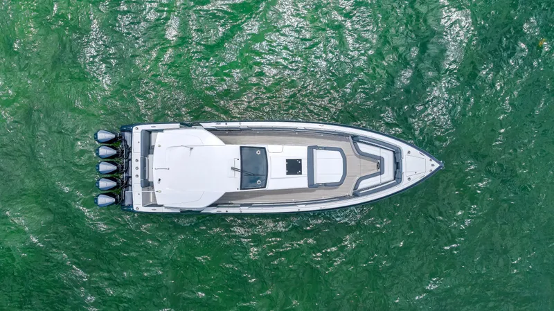 Slide: The Image of Aerial view of 2022 Cigarette 42 Auroris boat on green water. - 17