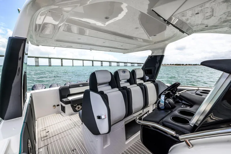 Slide: The Image of 2022 Cigarette 42 Auroris luxury boat interior with sleek seating and ocean view. - 27