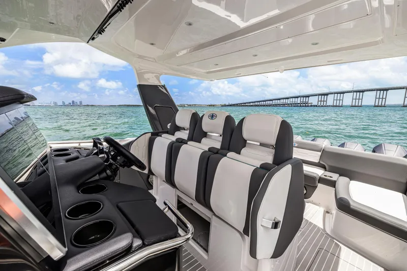 Slide: The Image of Interior of 2022 Cigarette 42 Auroris boat with luxurious seating and ocean view. - 29