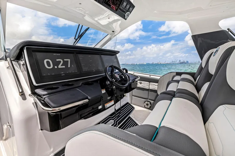 Slide: The Image of Interior of 2022 Cigarette 42 Auroris boat with modern dashboard and ocean view. - 30