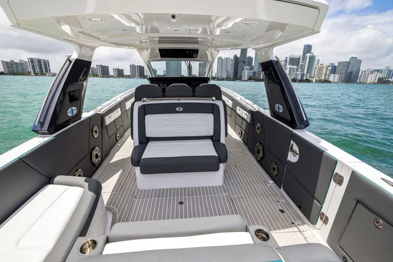 Slide: The Image of Luxurious 2022 Cigarette 42 Auroris boat interior with city skyline in background. - 36