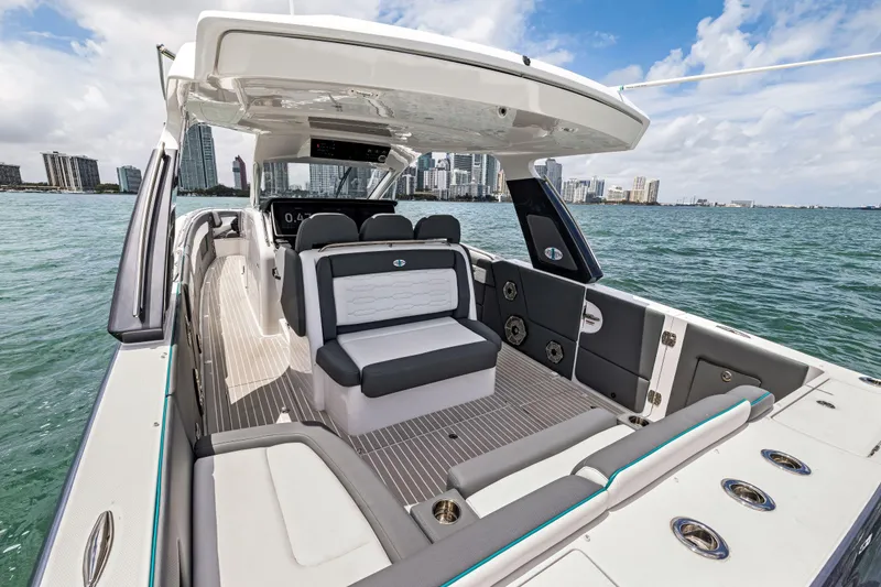 Slide: The Image of 2022 Cigarette 42 Auroris luxury boat interior with city skyline and ocean view. - 37