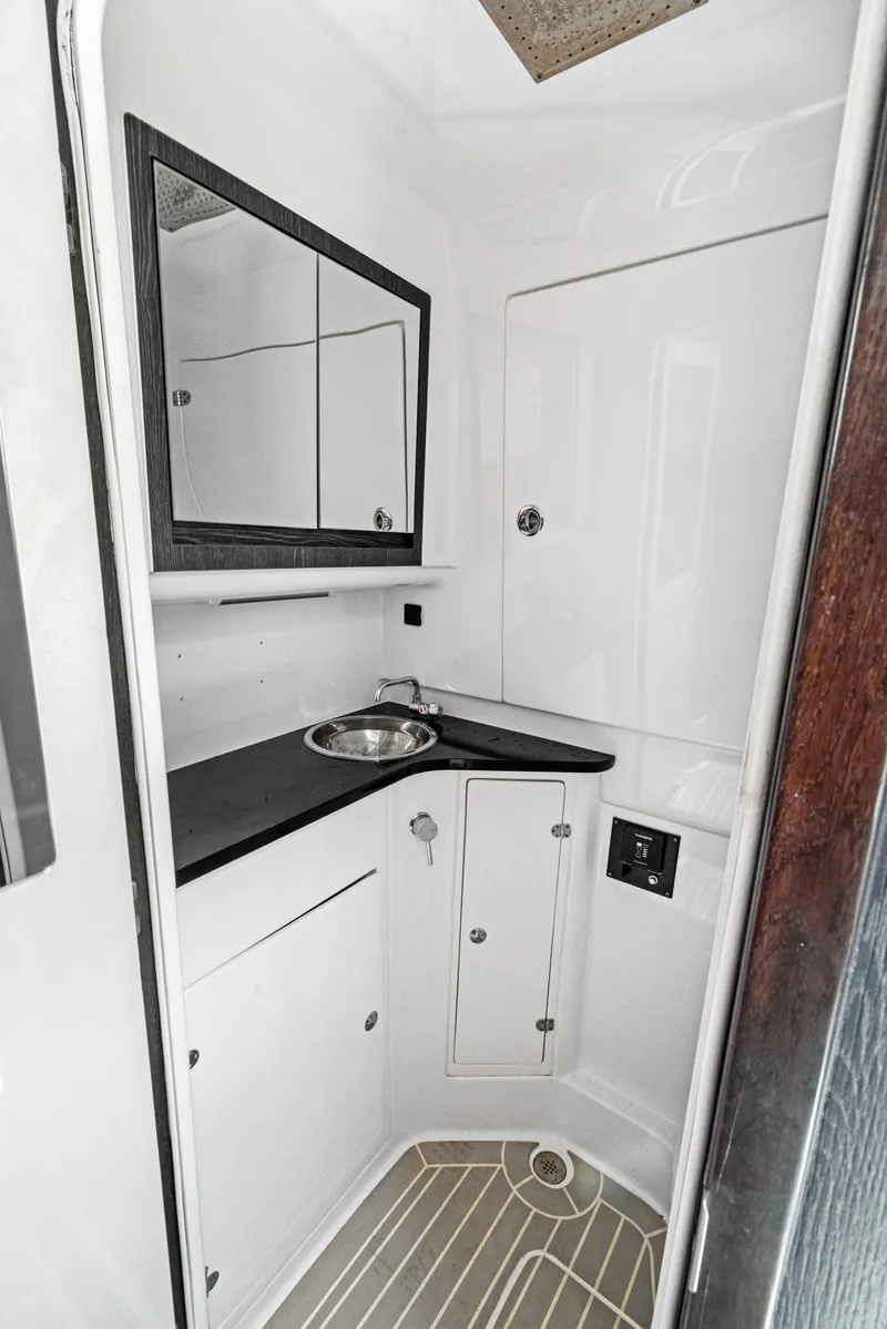 Slide: The Image of 2022 Cigarette 42 Auroris boat bathroom with sleek design and modern fixtures. - 44