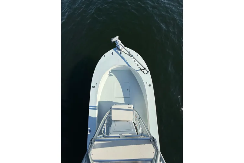 Slide: The Image of 1987 Privateer 22 Roamer boat bow on calm water, top view. - 17