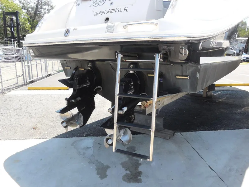 Slide: The Image of 2007 Sea Ray 290 Sundancer boat stern with ladder and dual propellers. - 10