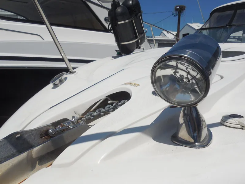 Slide: The Image of 2007 Sea Ray 290 Sundancer boat deck with anchor and spotlight. - 24