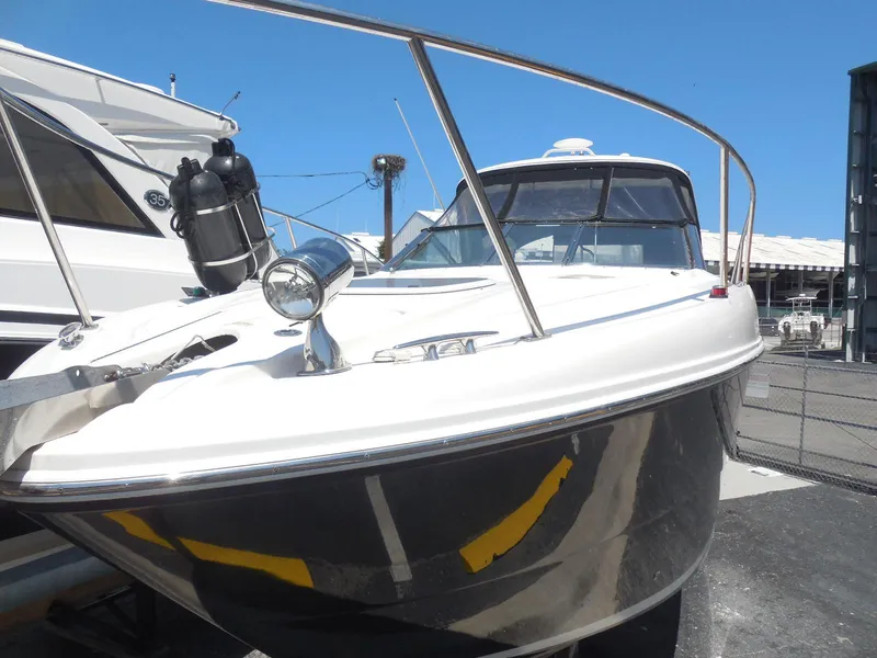Slide: The Image of 2007 Sea Ray 290 Sundancer boat docked, featuring sleek design and modern amenities. - 26