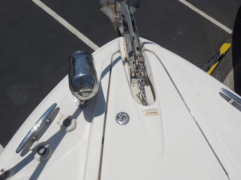 Slide: The Image of Bow of 2007 Sea Ray 290 Sundancer with anchor and cleats. - 30