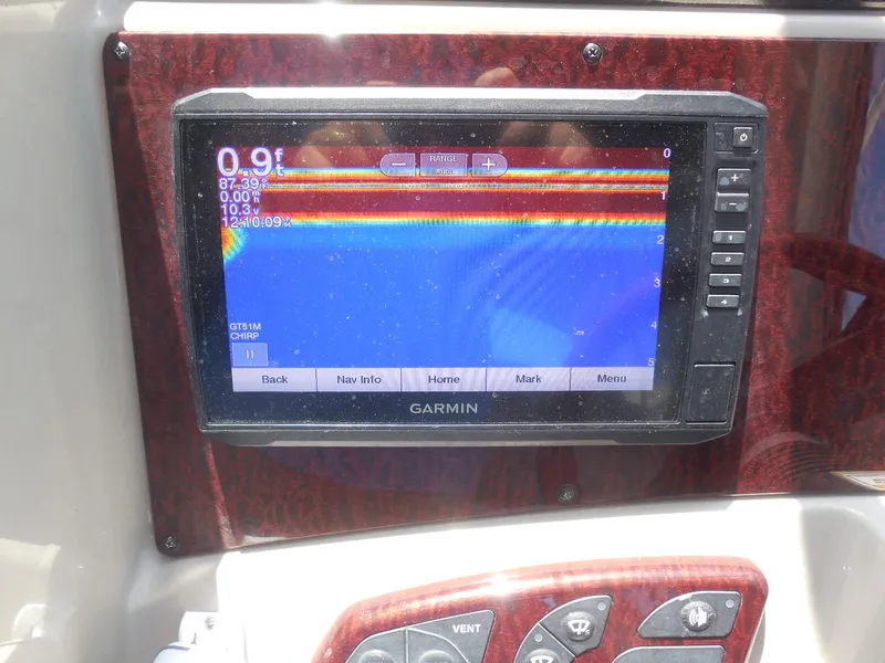 Slide: The Image of Garmin navigation display on 2007 Sea Ray 290 Sundancer boat dashboard. - 47