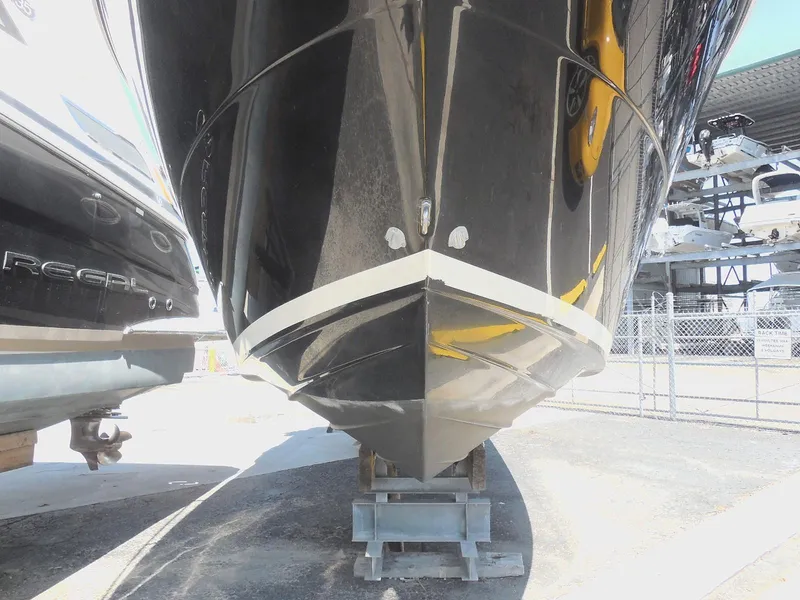 Slide: The Image of 2007 Sea Ray 290 Sundancer boat on dry dock, front view. - 7