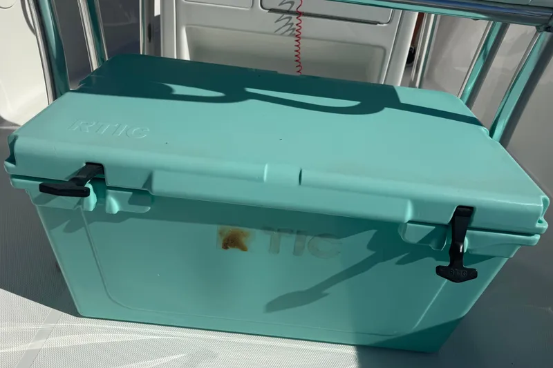 Slide: The Image of Turquoise RTIC cooler on 2014 Sea Hunt Triton 220 boat deck. - 15