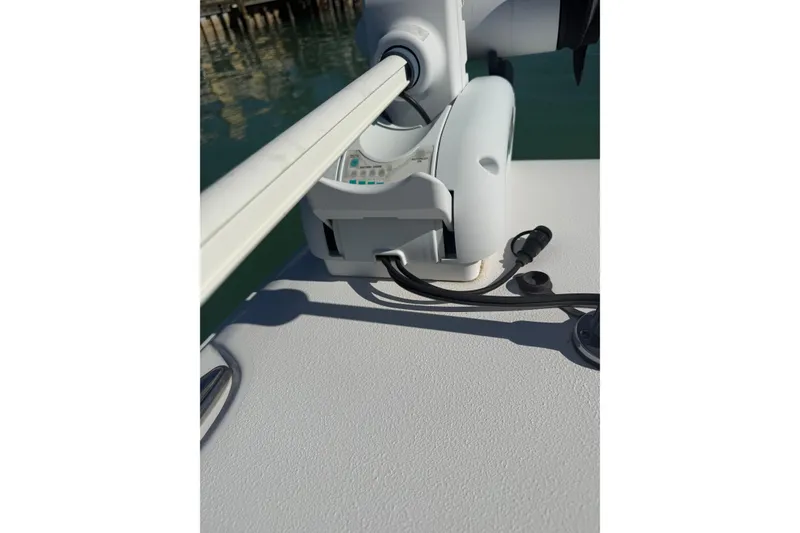 Slide: The Image of 2014 Sea Hunt Triton 220 boat deck with mounted equipment and cables. - 26