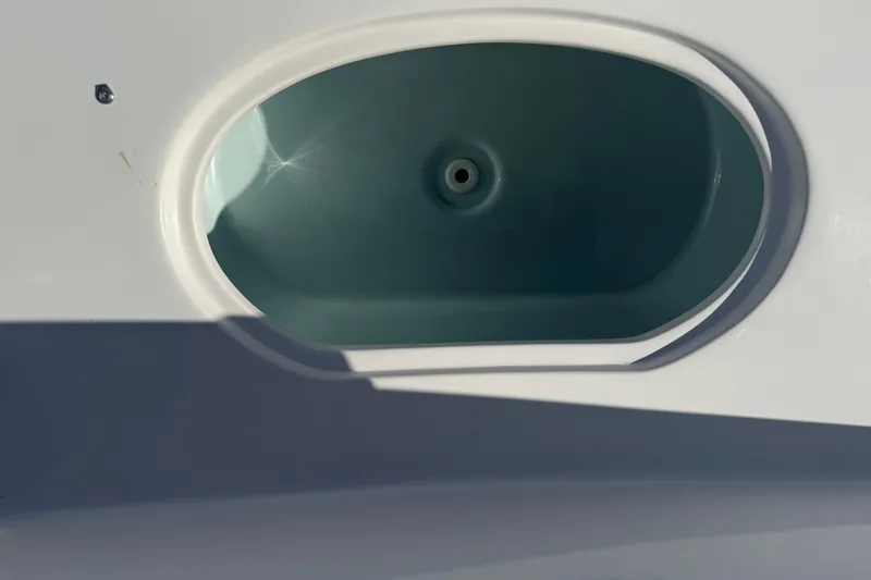 Slide: The Image of Livewell compartment on a 2014 Sea Hunt Triton 220 boat. - 39