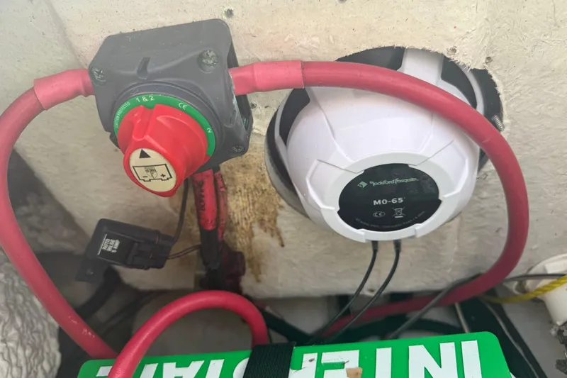 Slide: The Image of Electrical setup in a 2014 Sea Hunt Triton 220 boat with wiring and switch. - 51