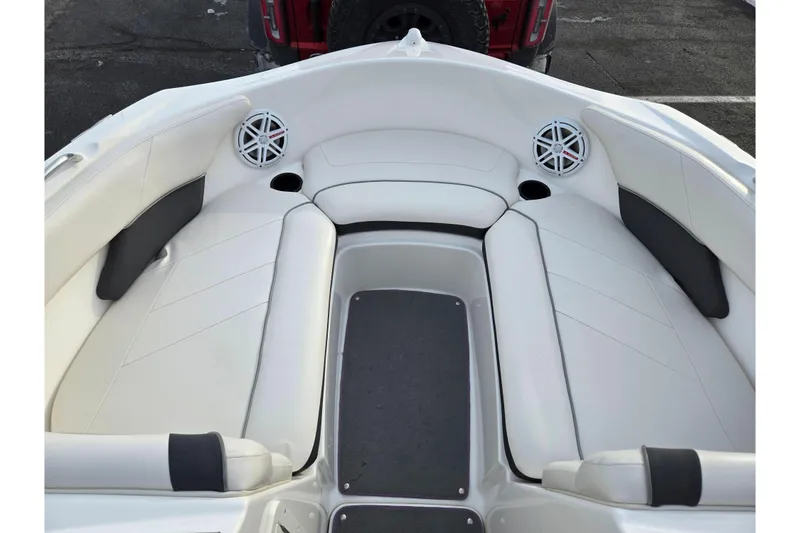 Slide: The Image of 2013 Yamaha Boats SX190 interior with white seating and speakers. - 17