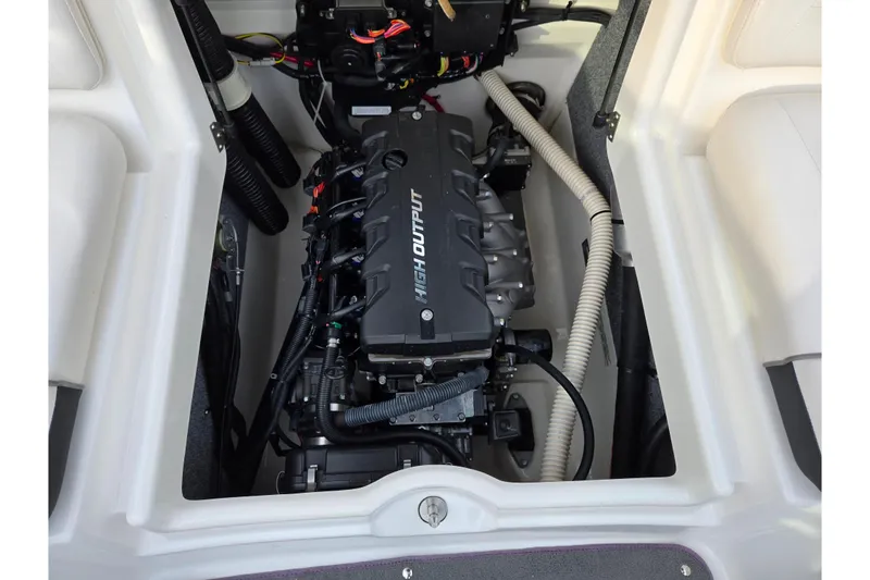 Slide: The Image of 2013 Yamaha Boats SX190 engine compartment showcasing high output engine components. - 22
