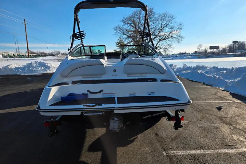 Slide: The Image of 2014 Yamaha Boats AR192 in snowy parking lot, rear view. - 2