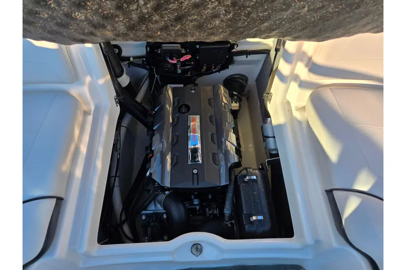 Slide: The Image of 2014 Yamaha Boats AR192 engine compartment, showcasing clean and organized layout. - 21