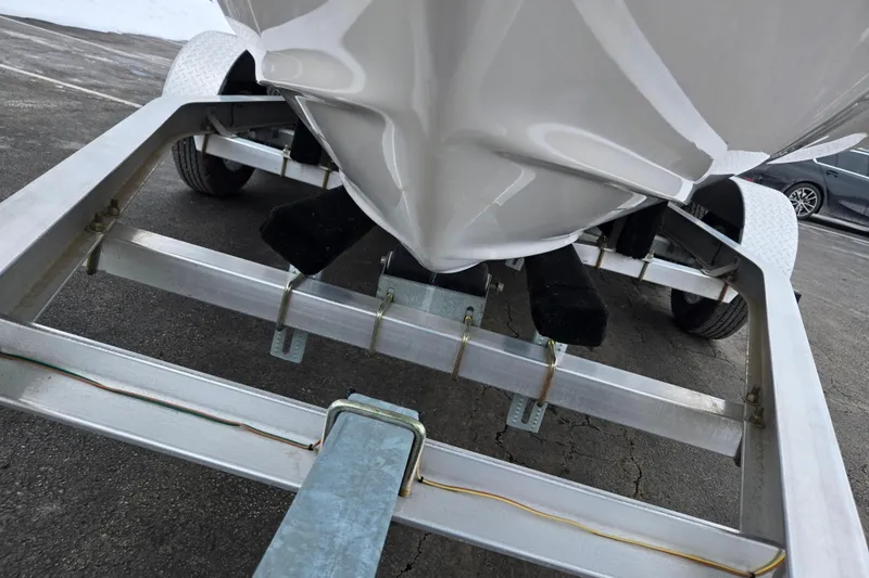 Slide: The Image of 2015 Regal 1900 ES Bowrider on trailer, close-up view of hull and frame. - 7