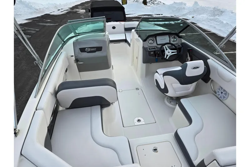 Slide: The Image of 2016 Chaparral 210 Suncoast Ski & Fish boat interior with modern seating and dashboard. - 10