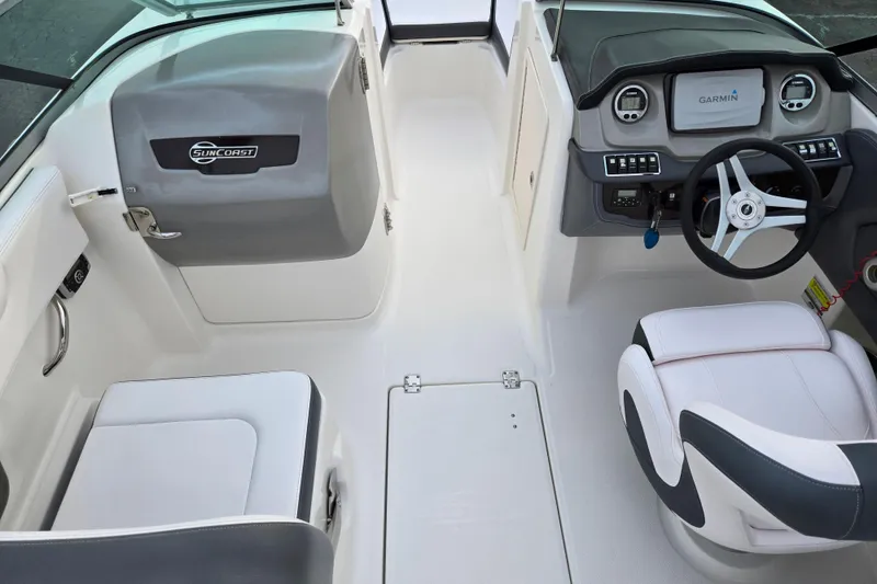 Slide: The Image of 2016 Chaparral 210 Suncoast Ski & Fish boat interior with steering wheel and seating. - 11