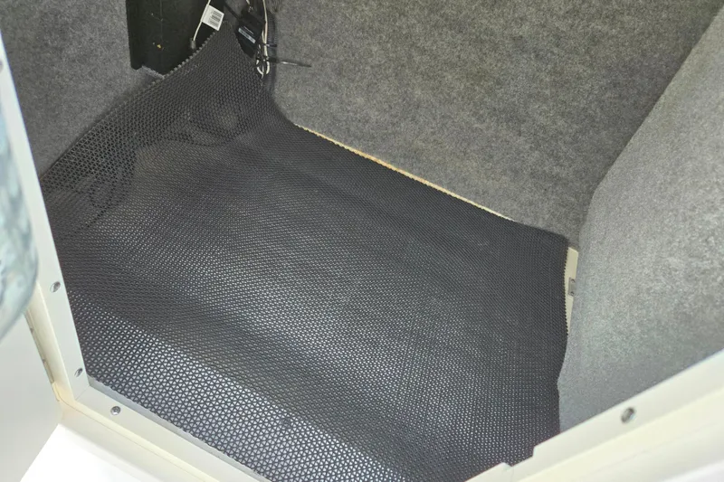 Slide: The Image of Interior storage compartment of 2016 Chaparral 210 Suncoast Ski & Fish boat. - 17