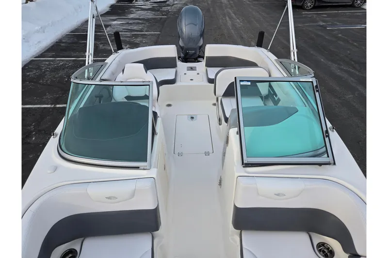 Slide: The Image of 2016 Chaparral 210 Suncoast Ski & Fish boat interior with seating and windshield. - 21