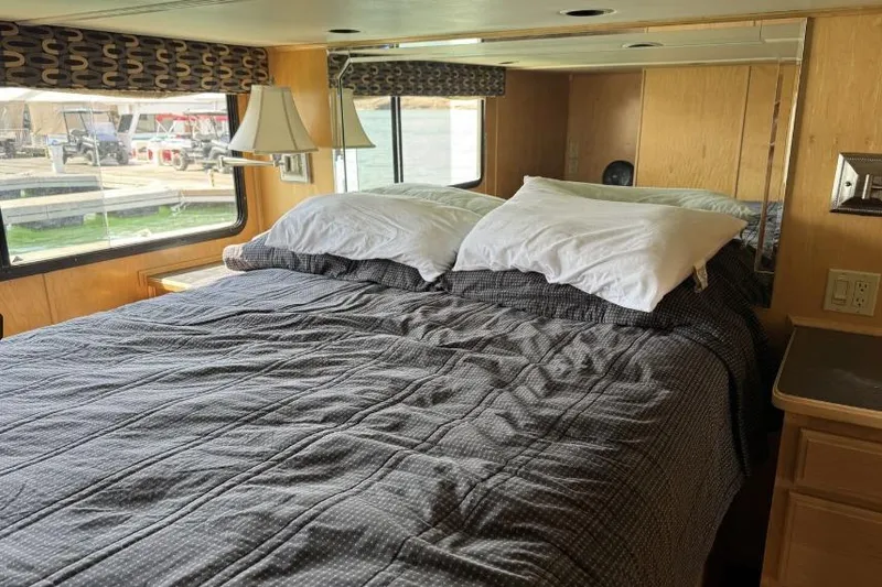 Slide: The Image of Cozy bedroom in 2006 American Waterways houseboat, Desert Rain Trip# 8, with waterfront view. - 18