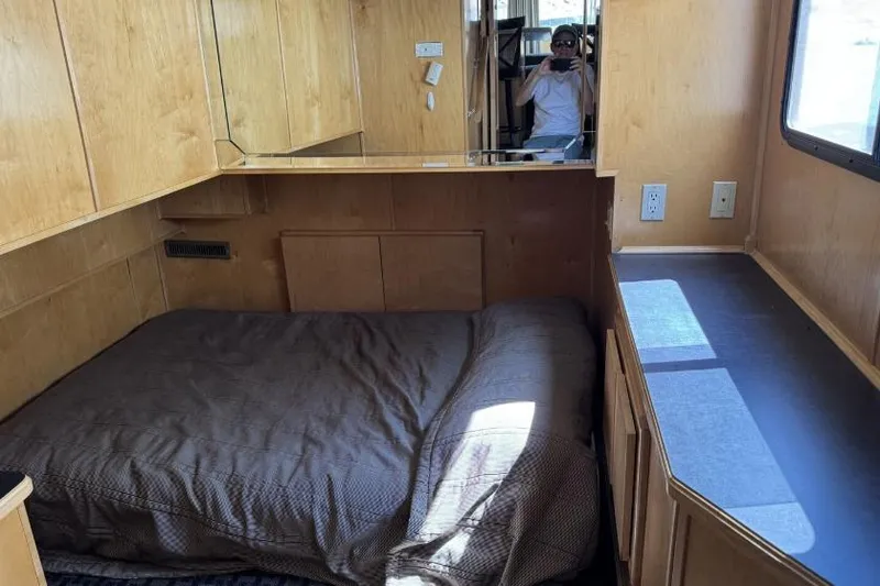Slide: The Image of Compact bedroom interior in a 2006 American Waterways Desert Rain Trip# 8 houseboat. - 20