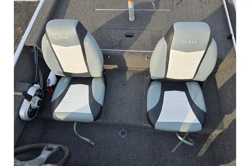 Slide: The Image of 2016 Lowe Skorpion boat seats, gray and white design, top view. - 18
